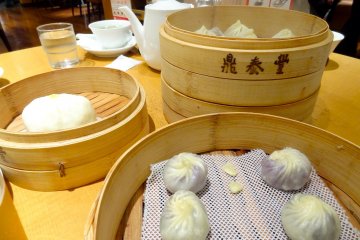 XiaoLongBao are buns traditionally steamed in bamboo baskets