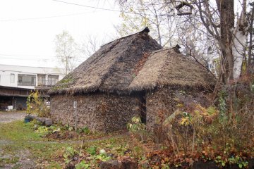 In the yard in front of the museum, there is a functional Ainu hut.