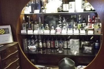 <p>Shochu and other souvenirs for sale at reception</p>