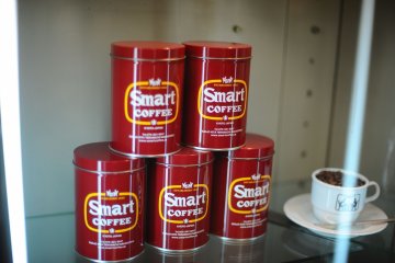 <p>Coffee beans can be purchased to go in these tins</p>