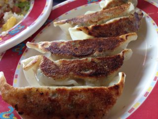 Dragon&#39;s gyoza is distinctly crispy on one side; I like to poke a hole into the tender side with my chop sticks&nbsp;to allow the gyoza sauce to fill the inside of the dumpling