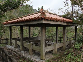 Park trails in the area lead to this resting point; the Ryukyuan red tile roofed structure seats about 20 but doesn&#39;t offer great views of the area due to the many surrounding trees and the slope of the hills