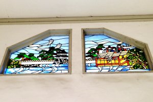 The stained glassed windows of Kishiwada Castle is medieval, art deco and Japanese at the same time