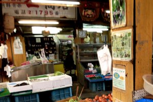 Stop by to chat with the old family grocers like this along the back streets of Kishiwada