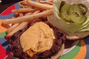 <p>The Cajun Burger is more Tex-Mex than New Orleans, it&#39;s a large all beef patty that comes with pico de gallo, jalapeno cheese, jalapeno slices, condiments, and fries&nbsp;</p>