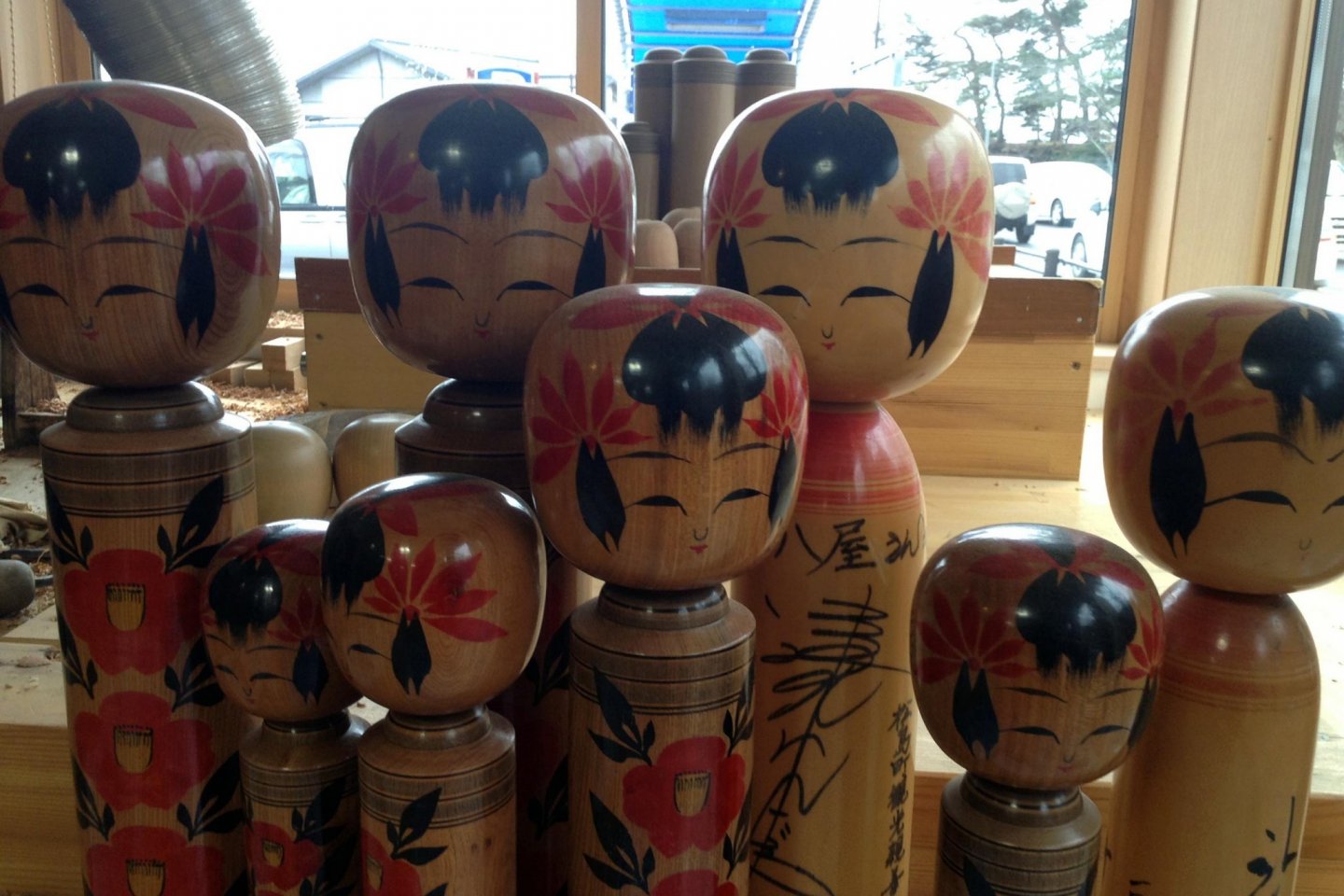 Some of the finished kokeshi dolls. 