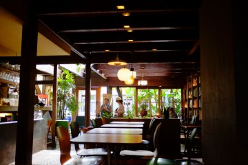 <p>The interior is warm and tastefully decorated with vintage wooden furniture</p>