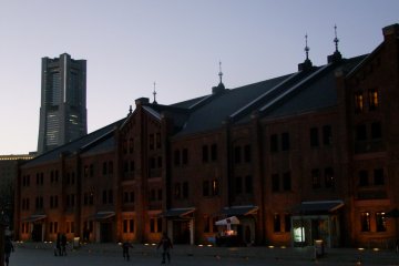 <p>Aka Renga Soko at sunset, with the Landmark Tower looming in the background</p>