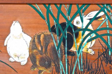 <p>One of the buildings features a series of rabbit paintings on its walls</p>